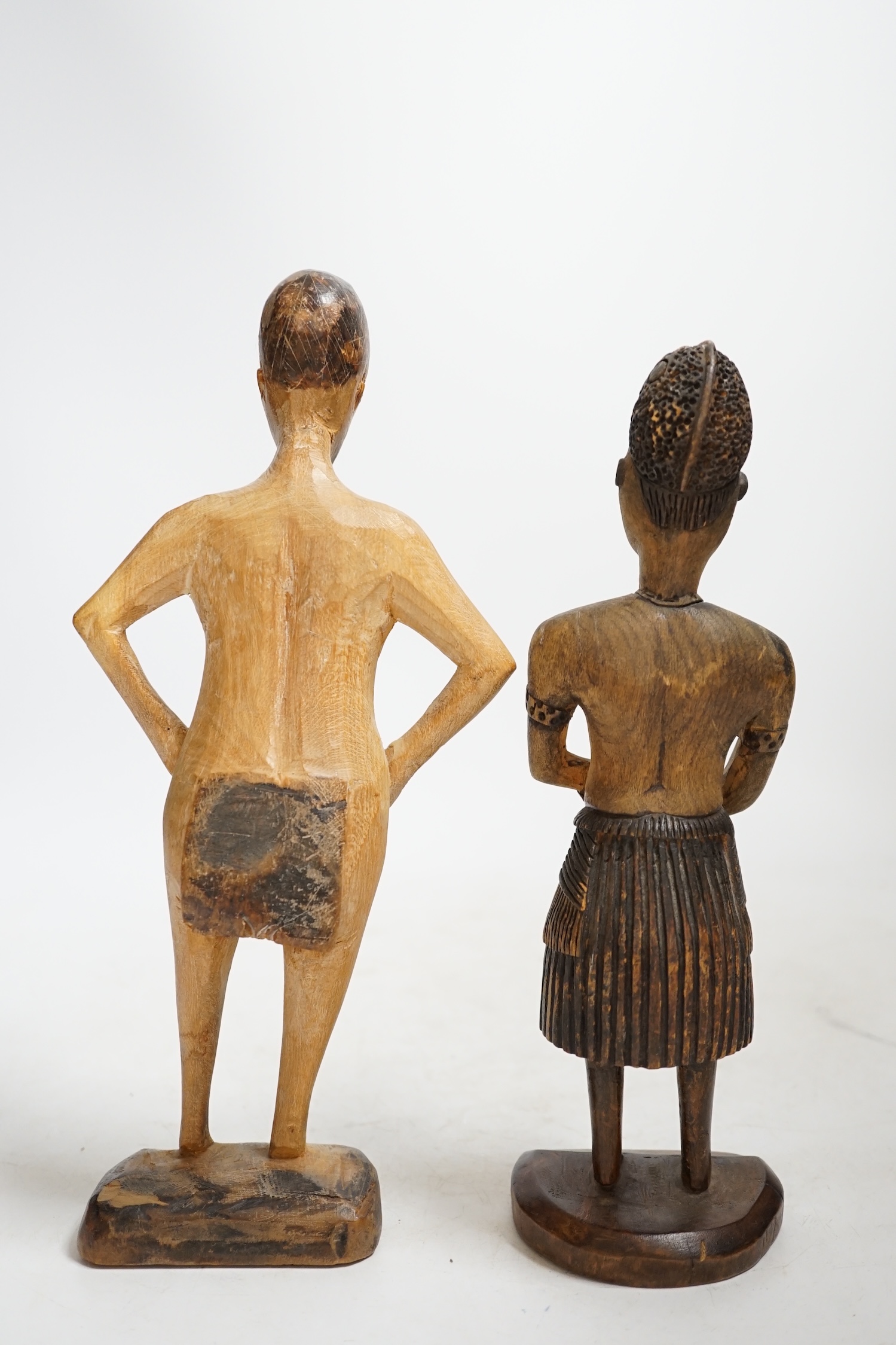 Two African carved wood figures, Akan people and probably Fanti, tallest 27cm. Condition - fair to good